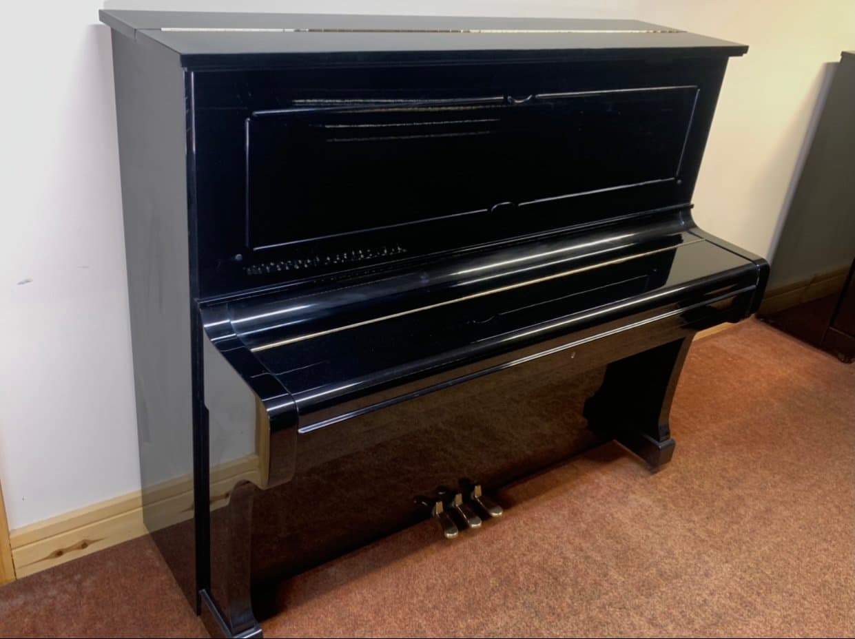 Upright piano in the Holland Pianos showroom